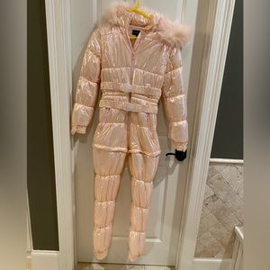Pink iridescent ski suit